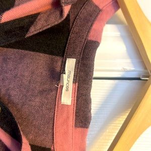 Long sleeves flannel shirt. Pink and black plaid.  Very cute w/leggings SZ 2